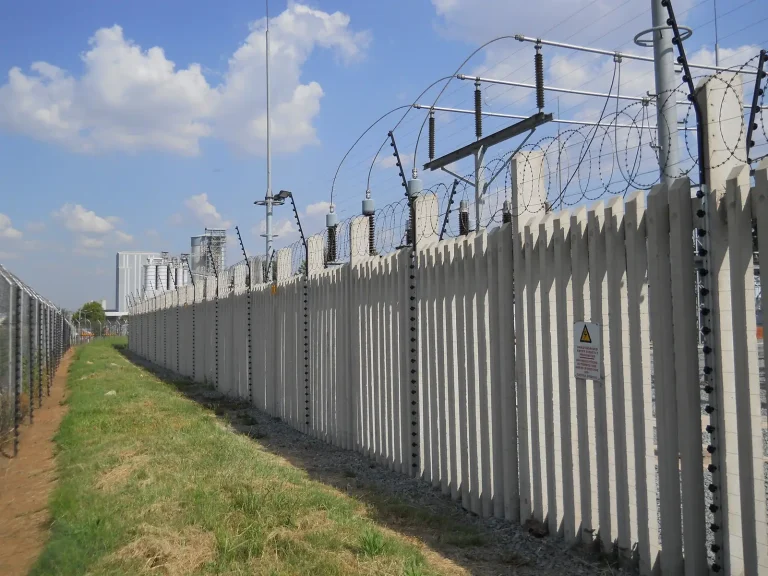 Electric fence on palisade at an industrial site
